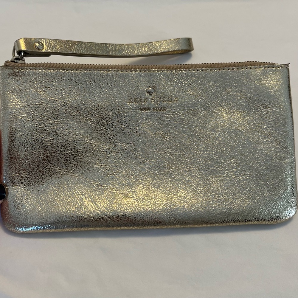 Kate Spade clutch wristlet wallet gold with wrist strap gently used